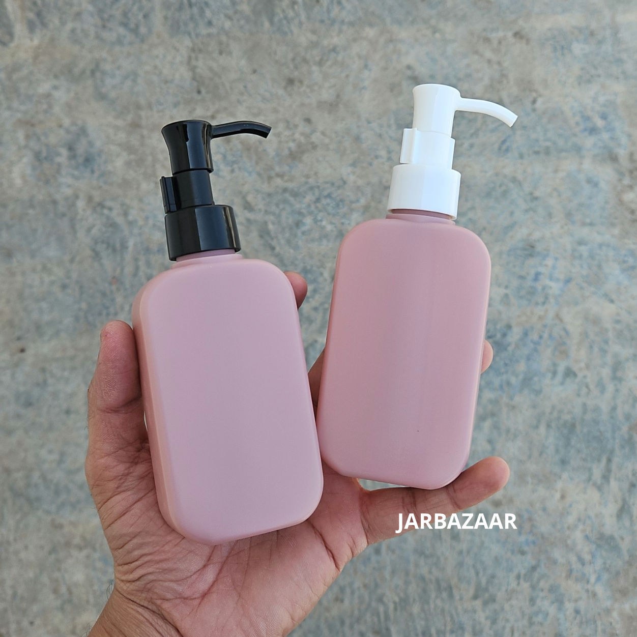 125 ML flat dark pink HDPE bottle with black and white sleek dispenser pumps