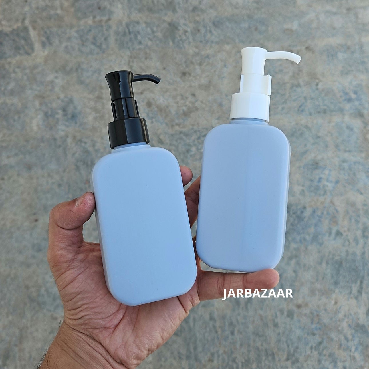 125 ML flat grey HDPE bottle with black and white sleek dispenser pumps
