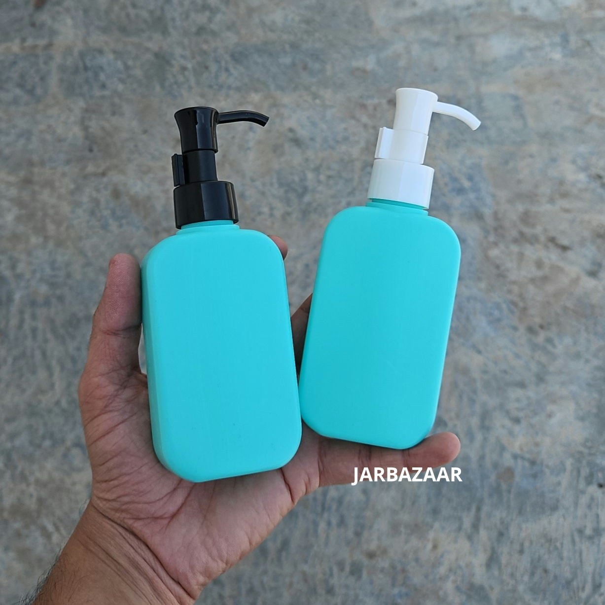 125 ML flat tile green HDPE bottle with black and white sleek dispenser pumps
