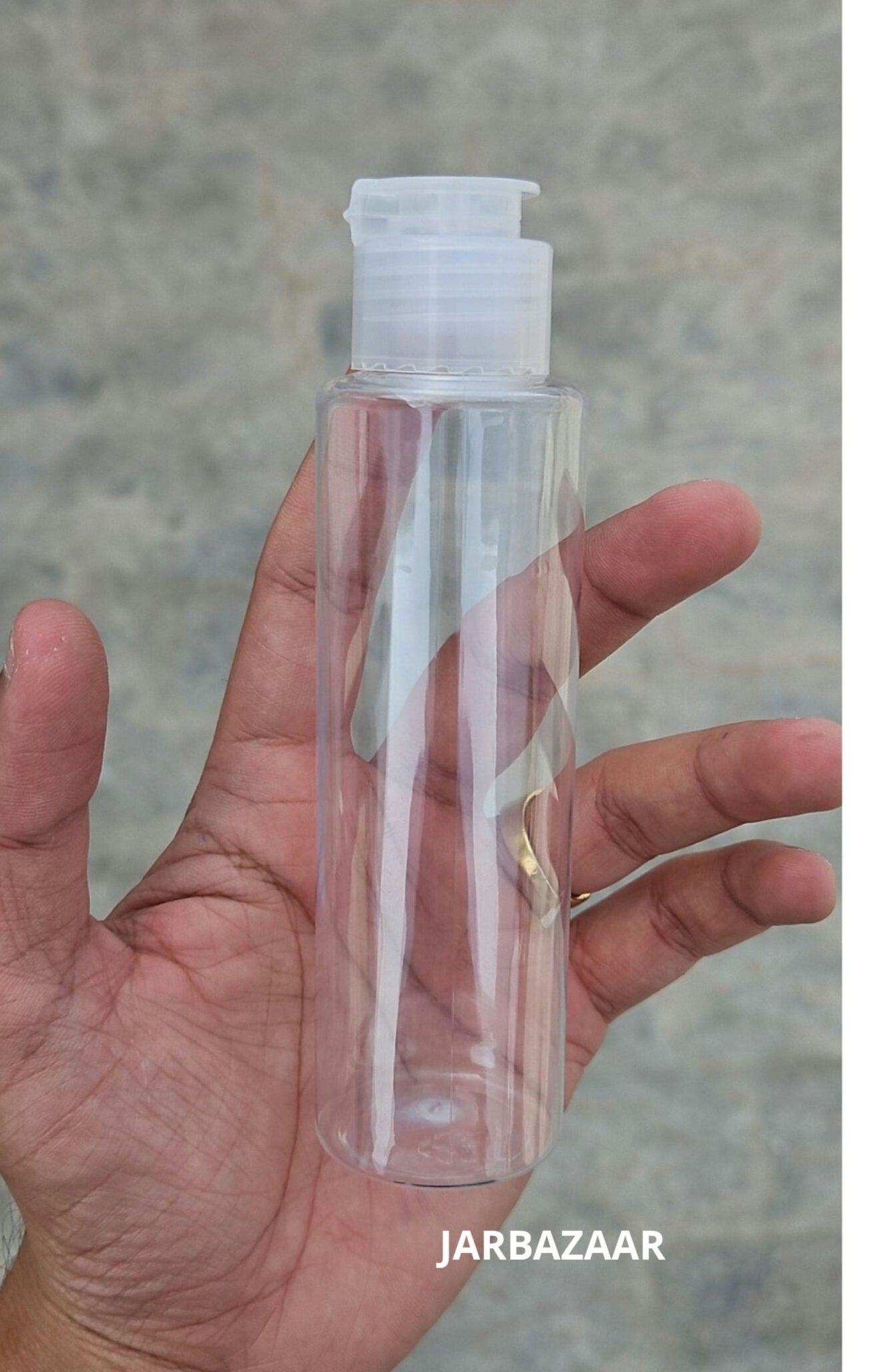 100 ML Sleek Transparent Fliptop Bottle