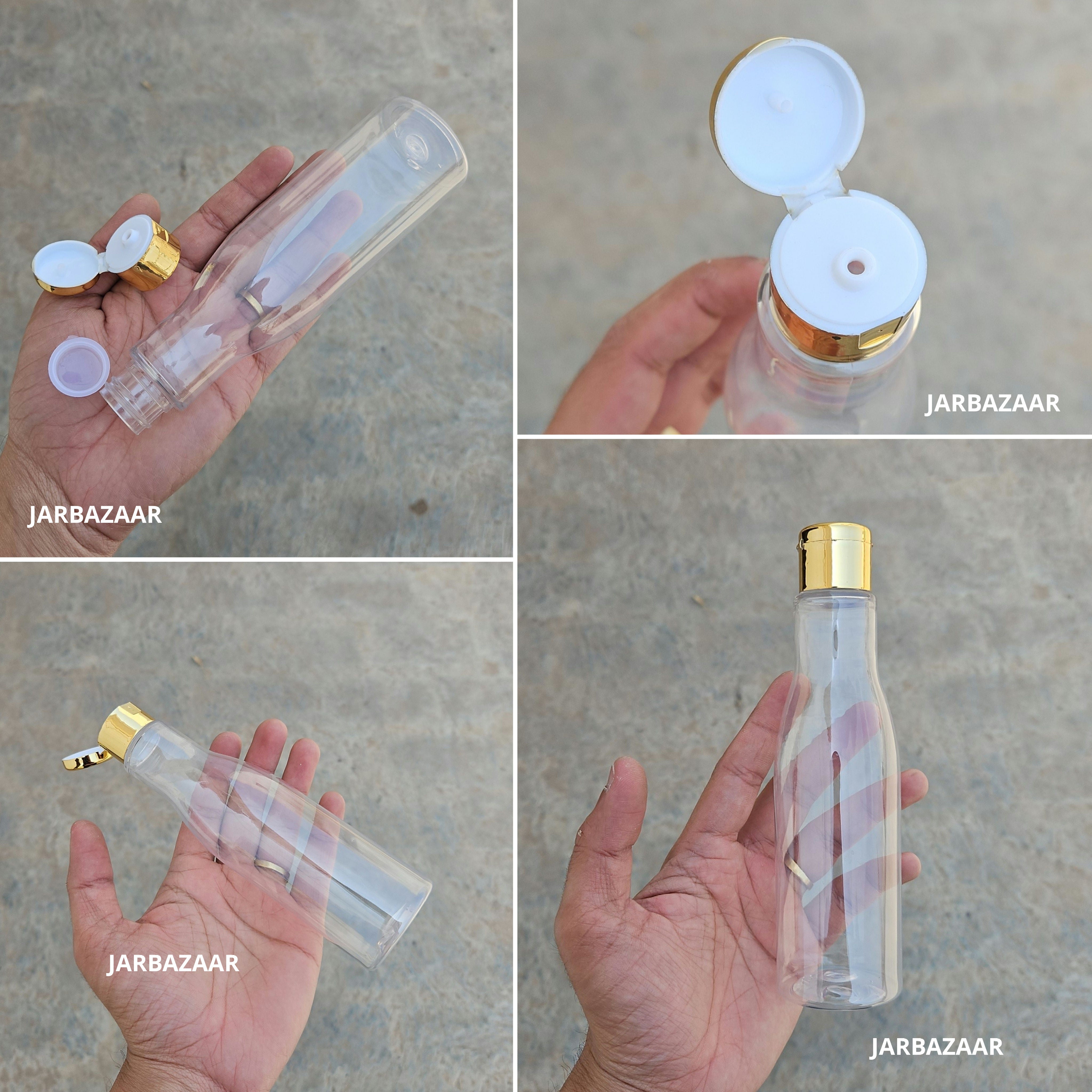 200 ML Asta Transparent Pet Bottle (With Golden Fliptop Caps)