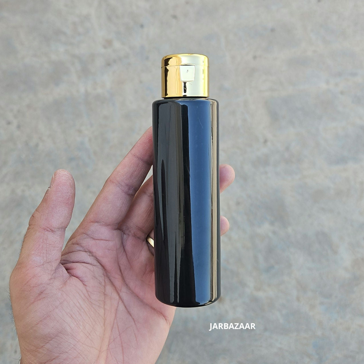 100 ML Sleek Black Pet Bottle (With Golden Fliptop Caps)