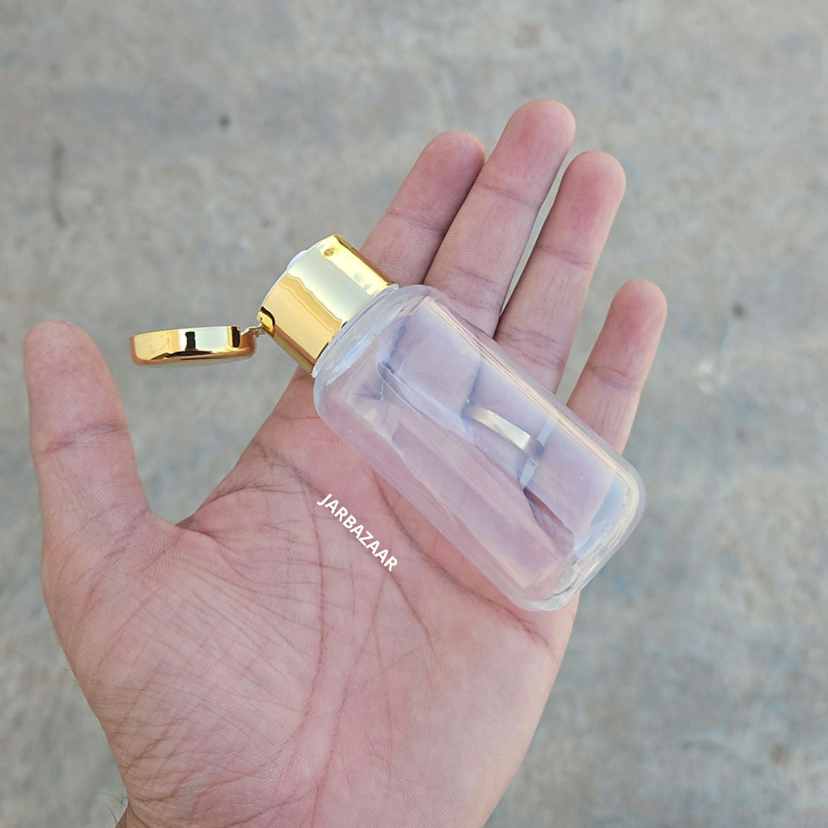 50 ML Boston Transparent Pet Bottle (With Golden Fliptop Caps)