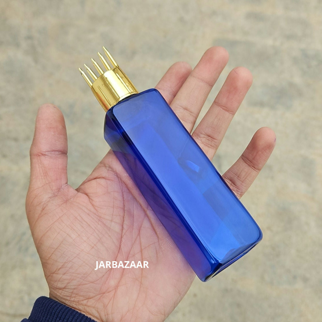 100 ML Square Blue Pet Bottle (With Golden Comb Cap)