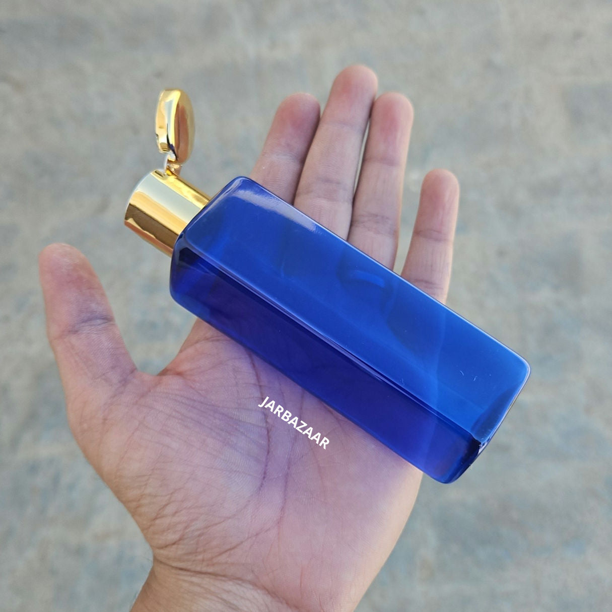 100 ML Square Blue Pet Bottle (With Golden Fliptop Caps)