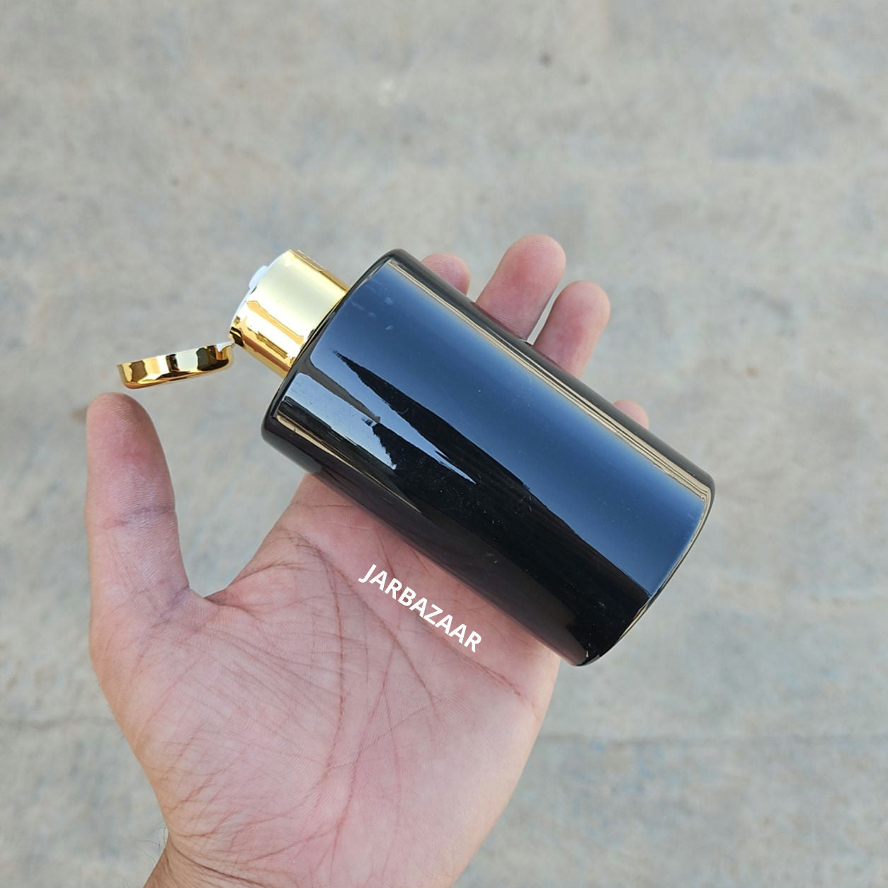 200 ML Rio Black Pet Bottle (With Golden Fliptop Caps)