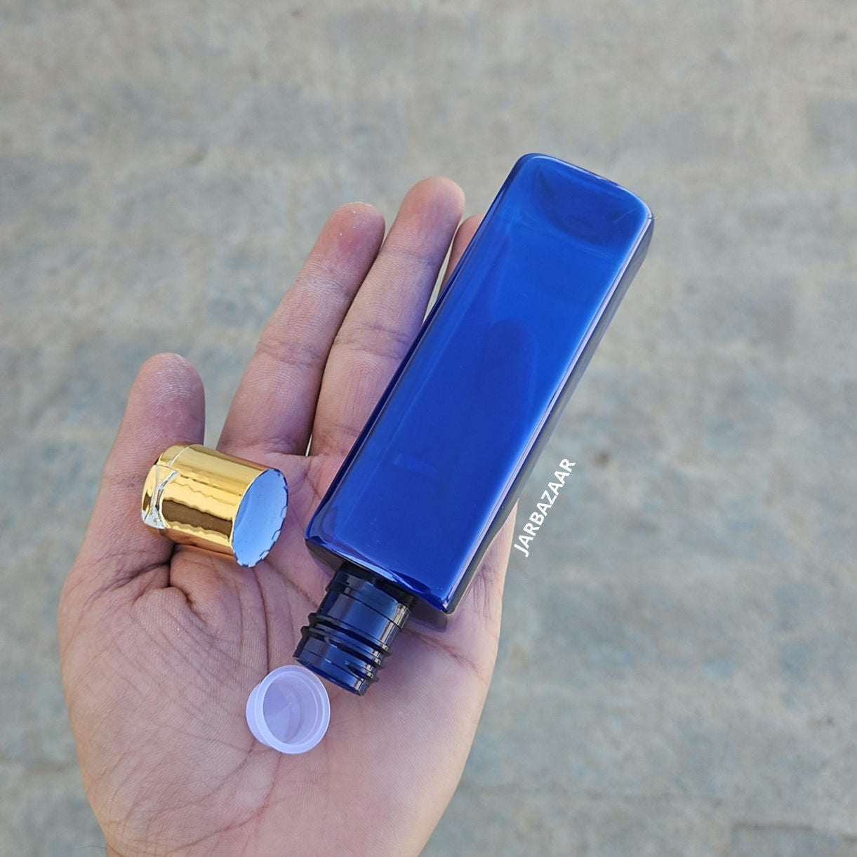 100 ML Square Blue Pet Bottle (With Golden Fliptop Caps)