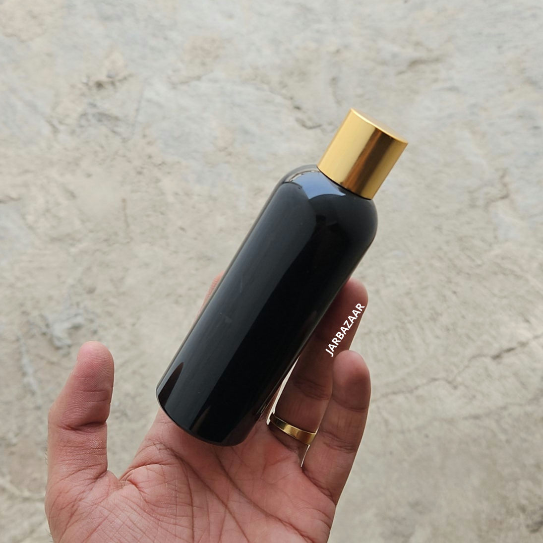 100 ml Avon Black Pet Bottle (Golden Cap)