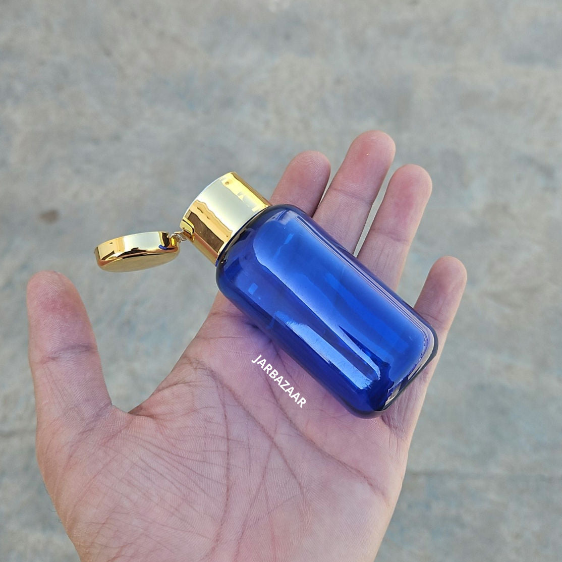 50 ML Boston Blue Pet Bottle (With Golden Fliptop Caps)