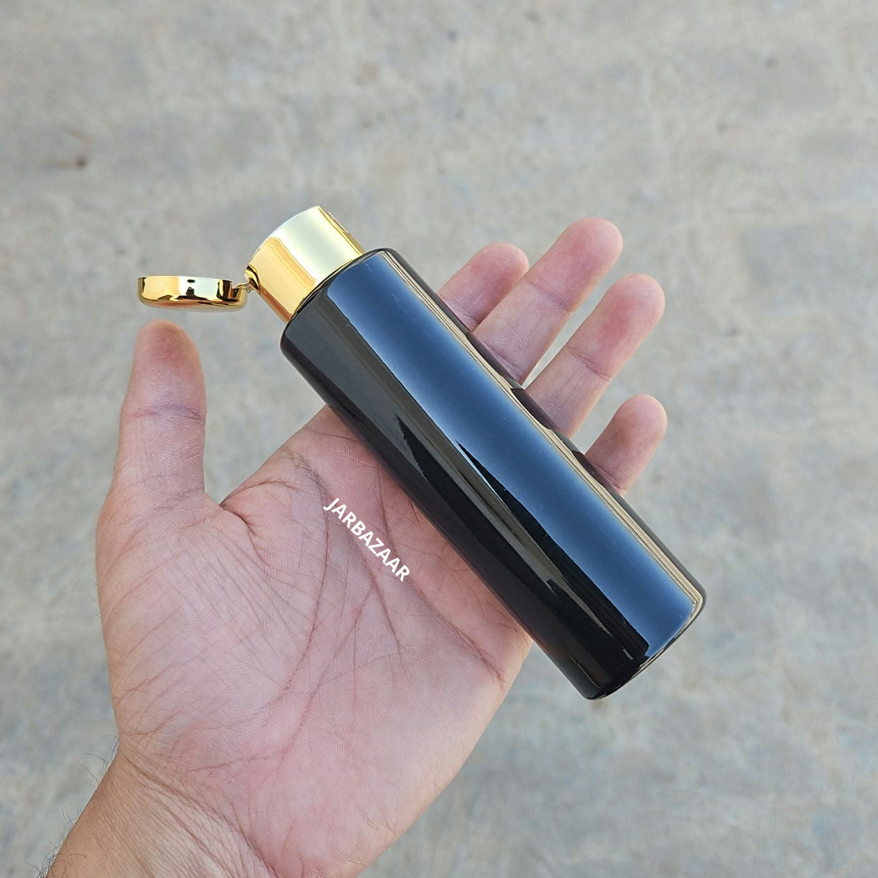100 ML Sleek Black Pet Bottle (With Golden Fliptop Caps)