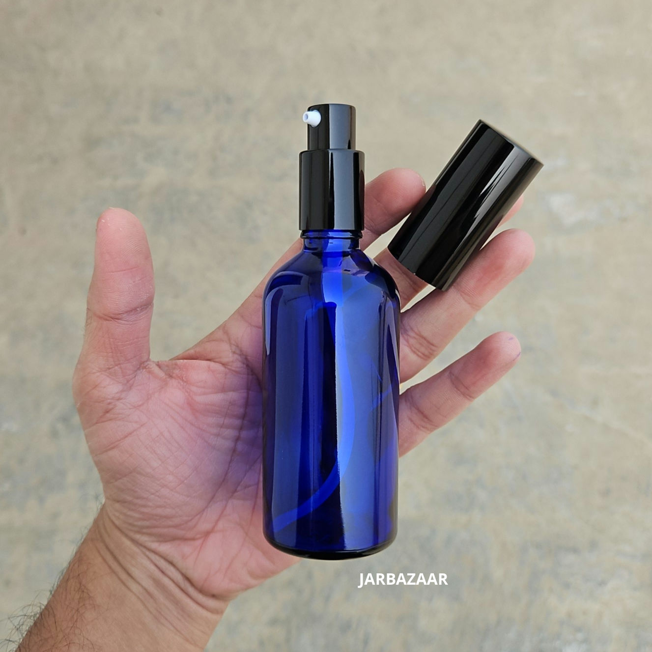 100 ml Blue Glass bottle (With Premium Black Serum Pumps)