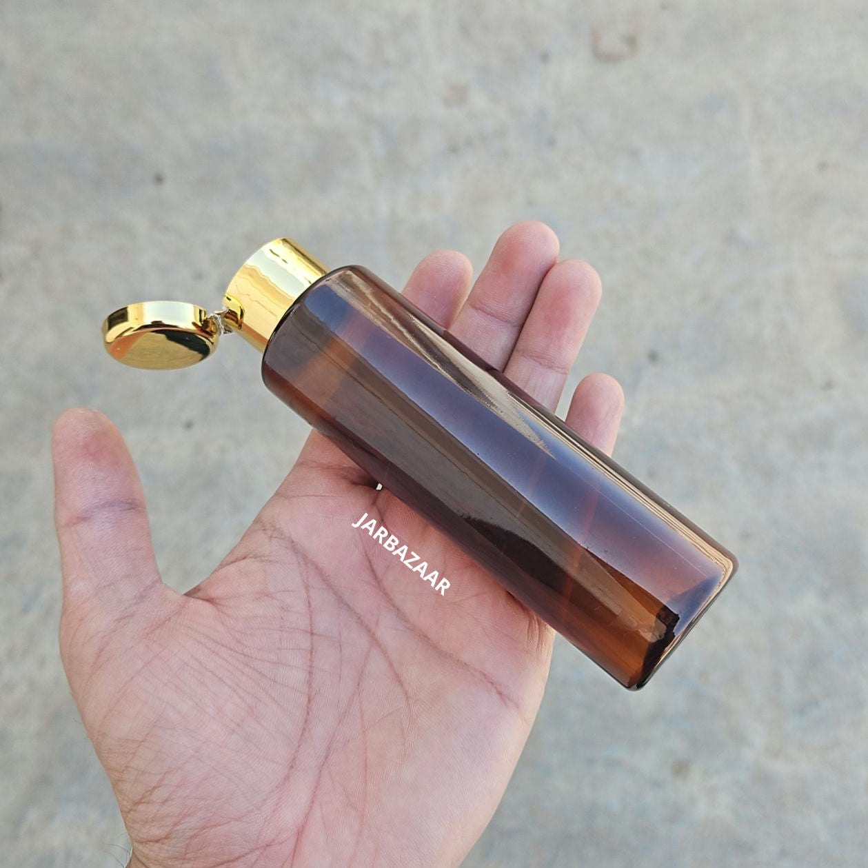 100 ML Sleek Amber Pet Bottle (With Golden Fliptop Caps)