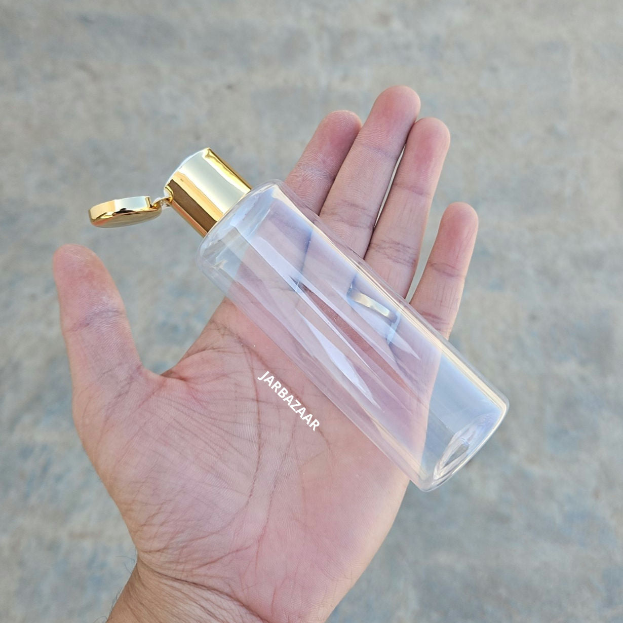 100 ML GLI Transparent Pet Bottle (With Golden Fliptop Caps)