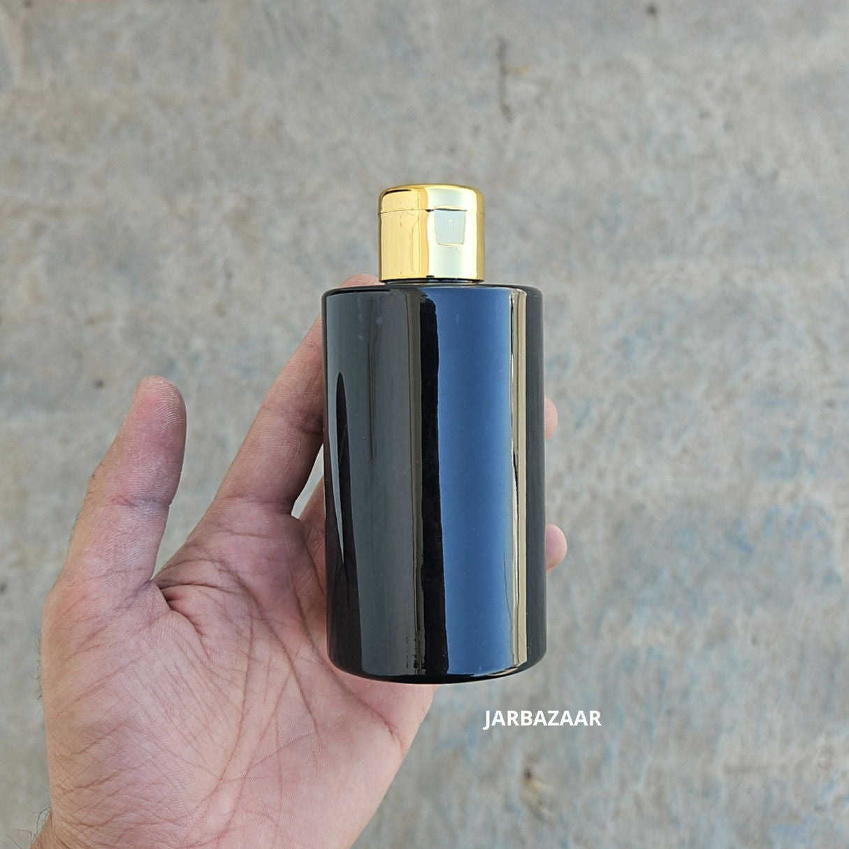 200 ML Rio Black Pet Bottle (With Golden Fliptop Caps)