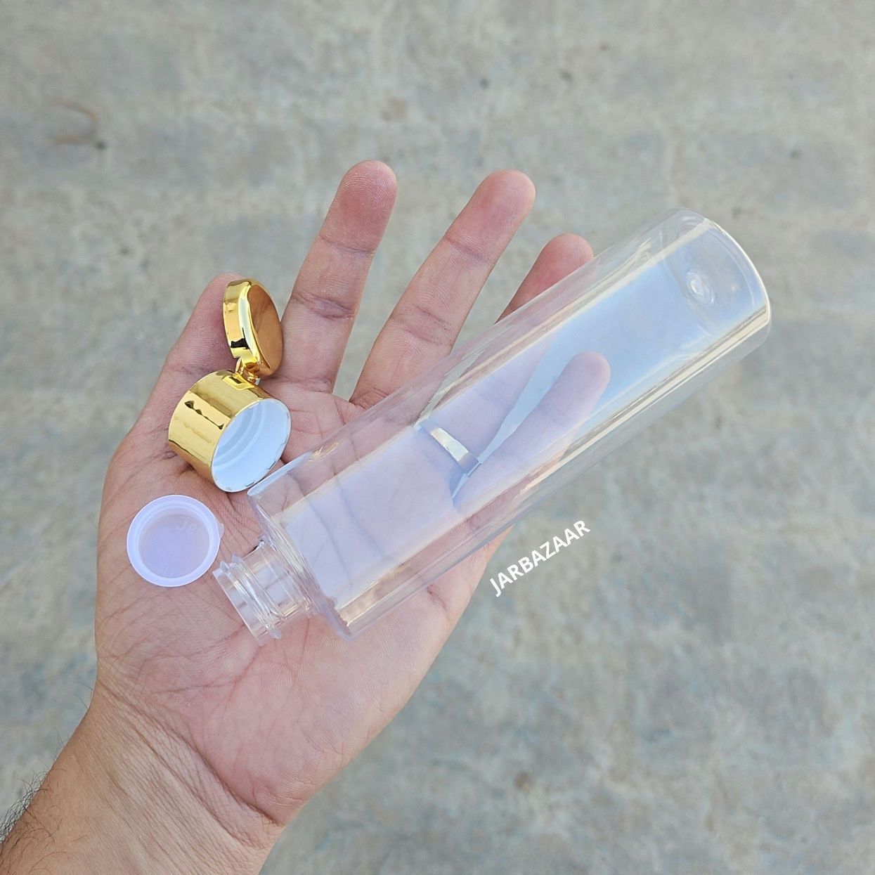 200 ML Sleek Transparent Pet Bottle (With Golden Fliptop Caps)