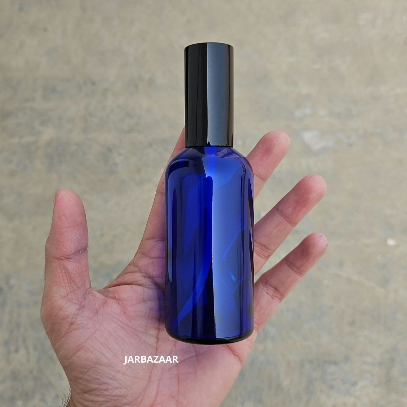 100 ml Blue Glass bottle (With Premium Black Serum Pumps)