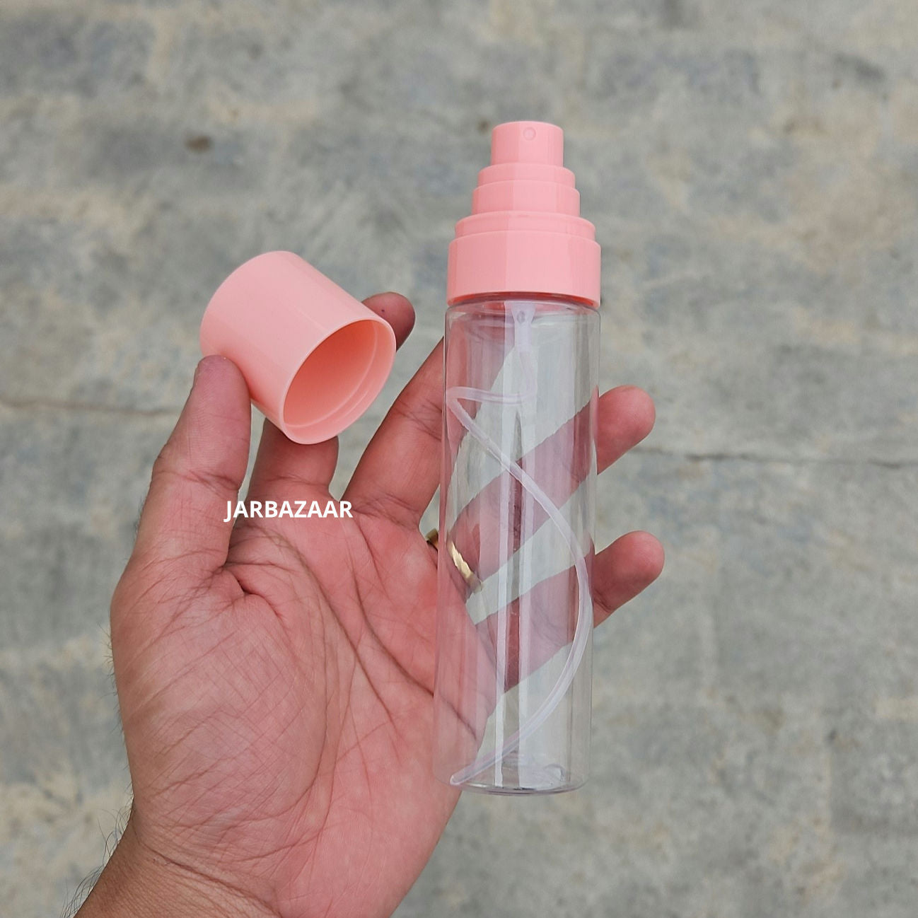 100 ML Sleek Transparent Pet Bottle (With Pink Opaque Spray Pumps)