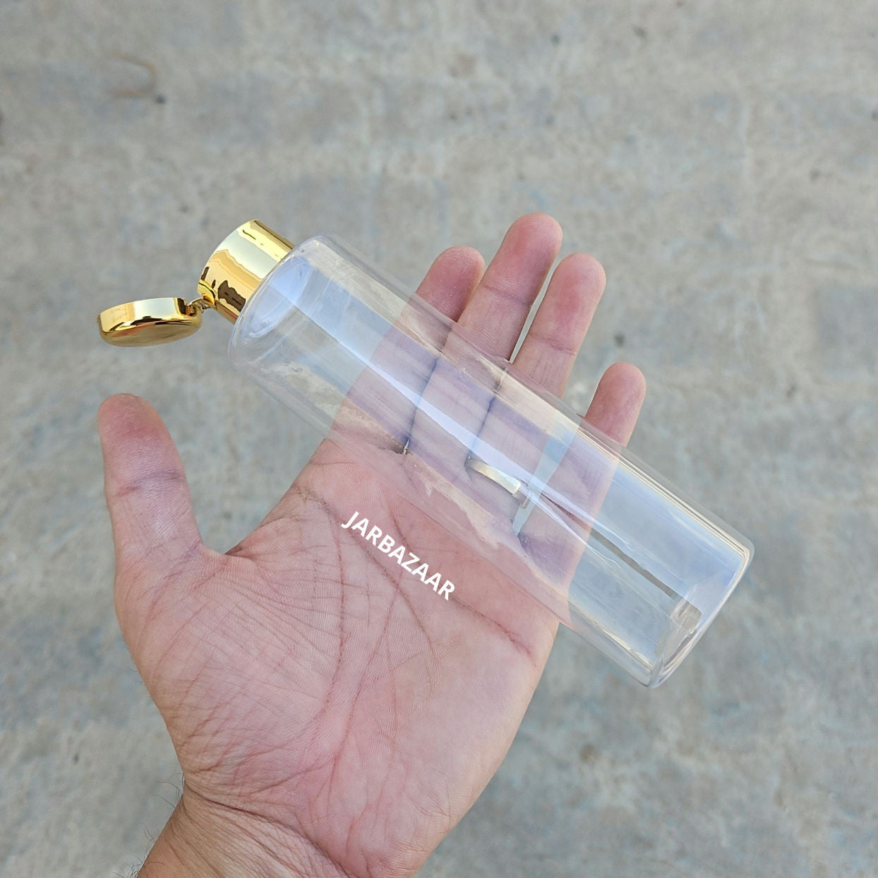 200 ML Sleek Transparent Pet Bottle (With Golden Fliptop Caps)