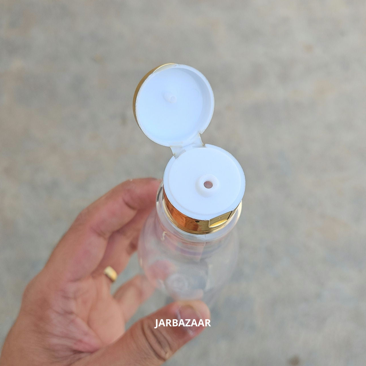 200 ML Asta Transparent Pet Bottle (With Golden Fliptop Caps)