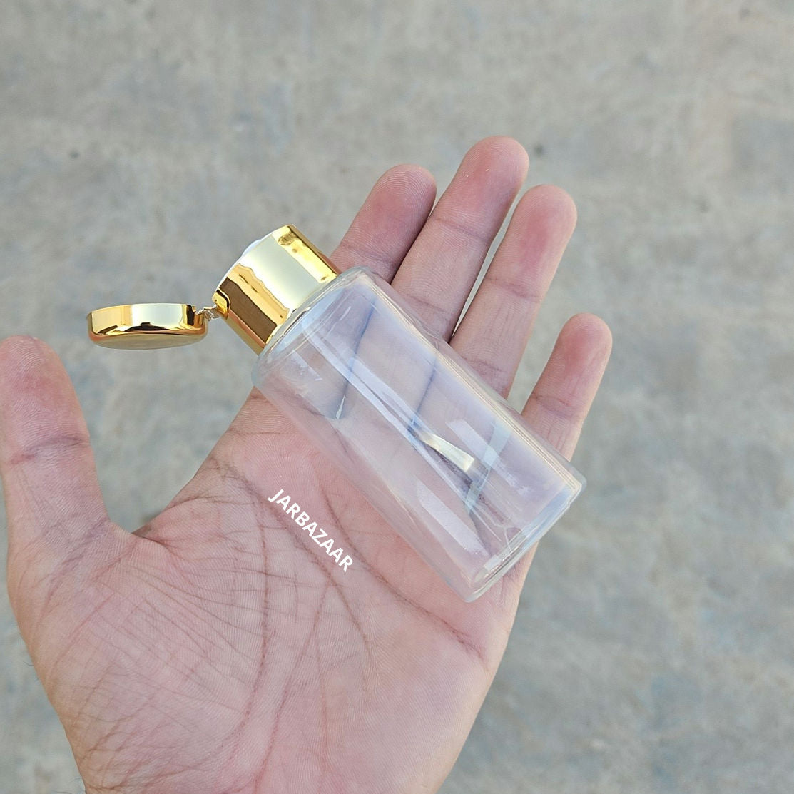 60 ML Transparent Pet Bottle (With Golden Fliptop Caps)
