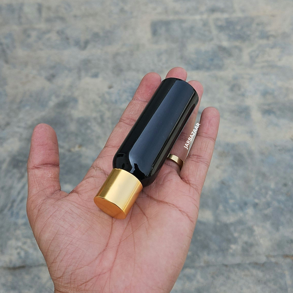 50 ml Avon Black Pet Bottle (Golden Cap)