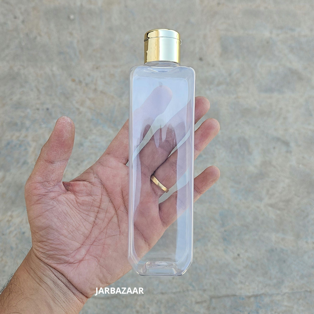 200 ML Cetra Transparent Pet Bottle (With Golden Fliptop Caps)
