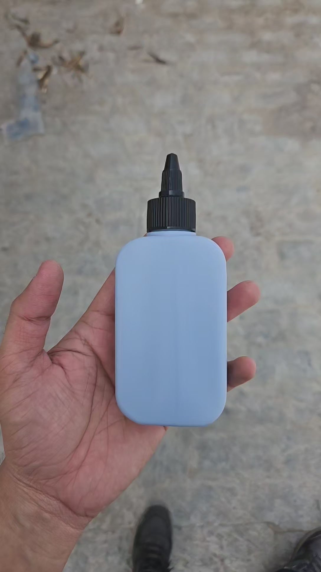 125 ML Flat Grey HDPE Bottle (With Nozzel Caps)