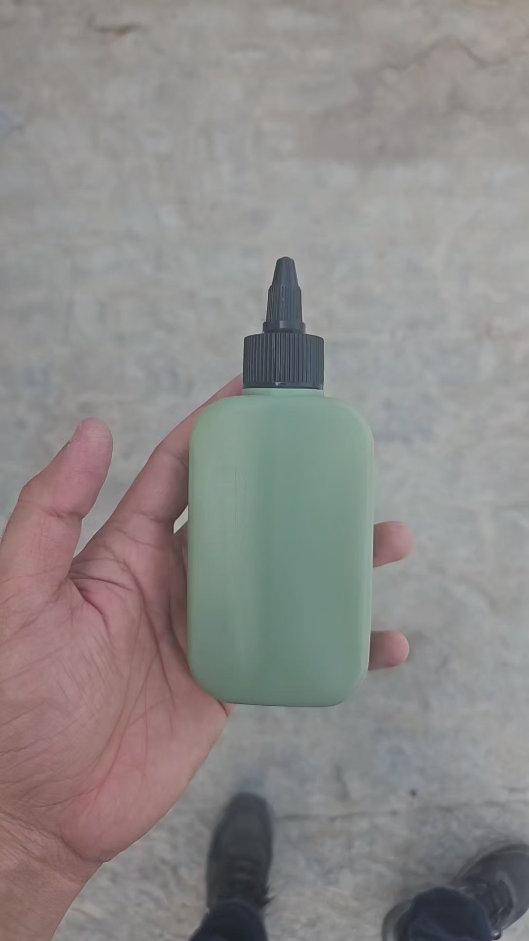 125 ML Flat Dark Green HDPE Bottle with Nozzle Cap
