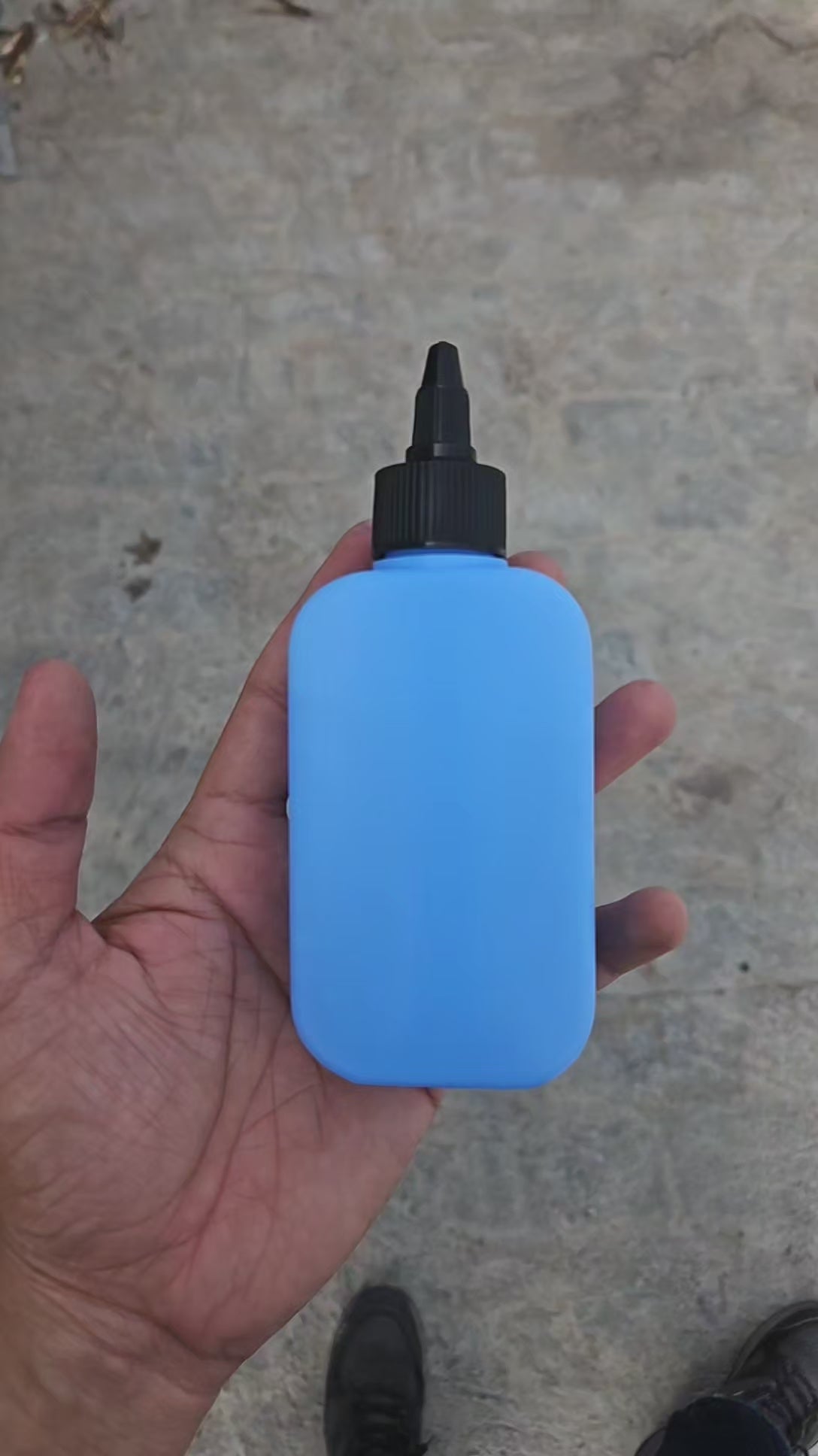 125 ML Flat Sky Blue HDPE Bottle (With Nozzle Cap)